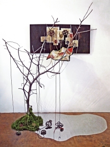 The Visit • Installation, Acrylic and Tar on Panel with Painted Canvases in Plexiglas, Faucet Valves with Painted Strings, Piece of a Civil War Era Quilt, Dead Tree and Reflecting Pool, 80 x 72 x 60 inches (variable tree size) (203.2 x 182.88 x 152.4 cm)
