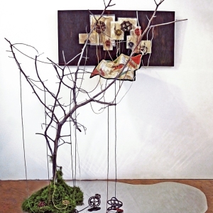 The Visit • Installation, Acrylic and Tar on Panel with Painted Canvases in Plexiglas, Faucet Valves with Painted Strings, Piece of a Civil War Era Quilt, Dead Tree and Reflecting Pool, 80 x 72 x 60 inches (variable tree size) (203.2 x 182.88 x 152.4 cm)